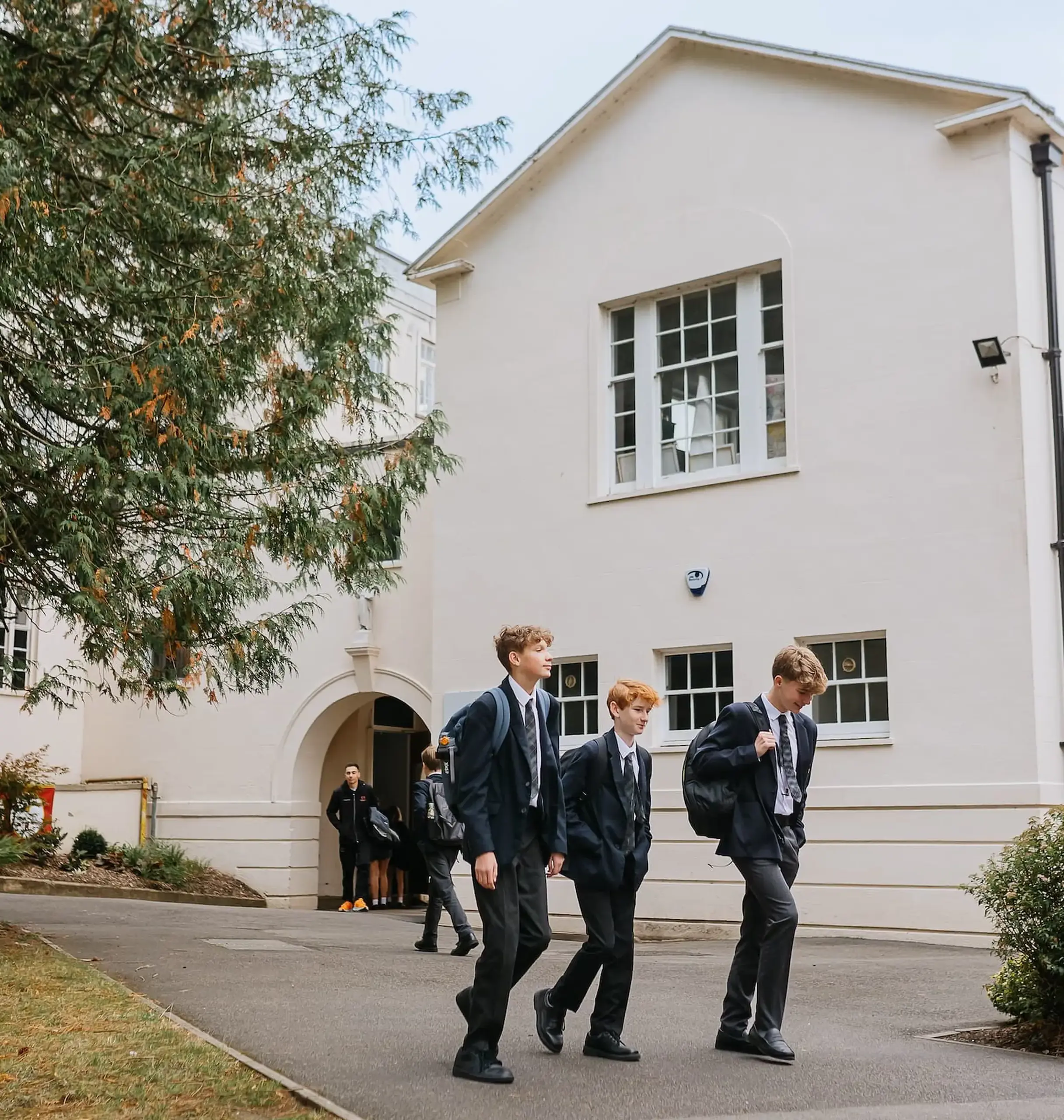 Students walking outside Radnor House building