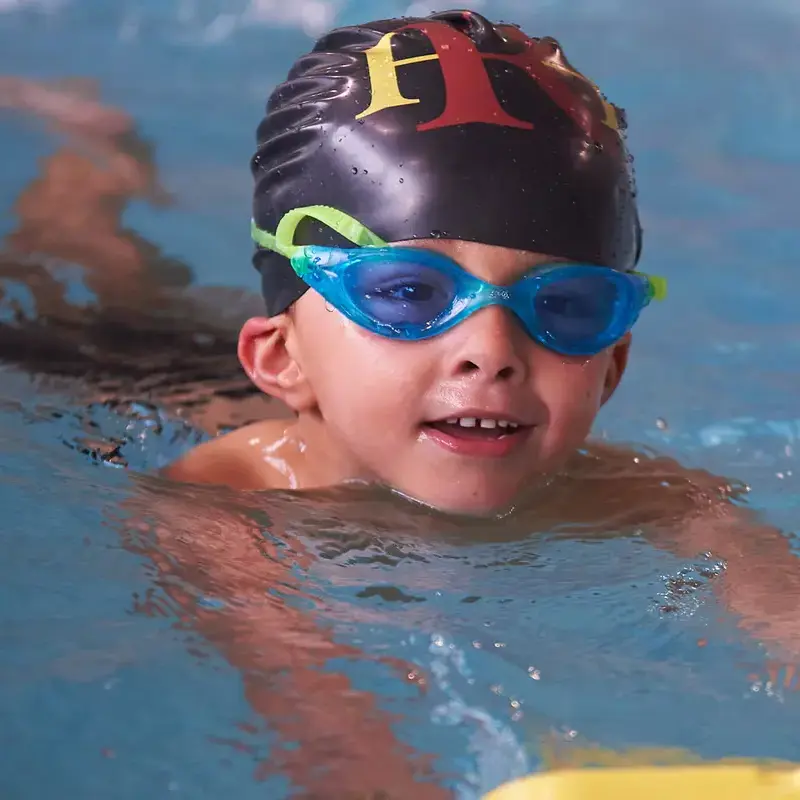 Pre-prep student swimming in the pool