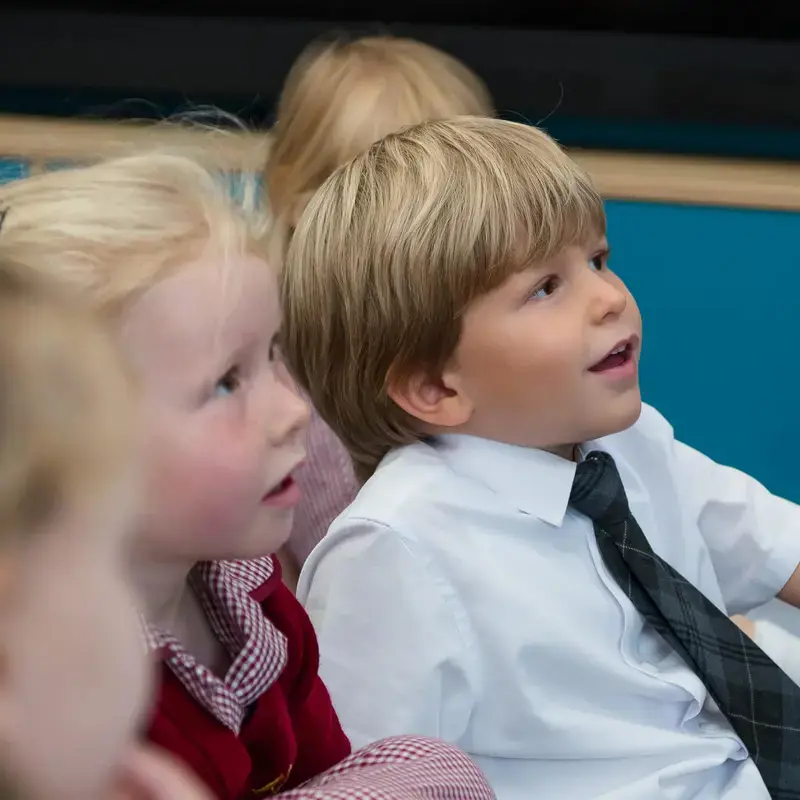 Radnor pupils listening to a story in the library