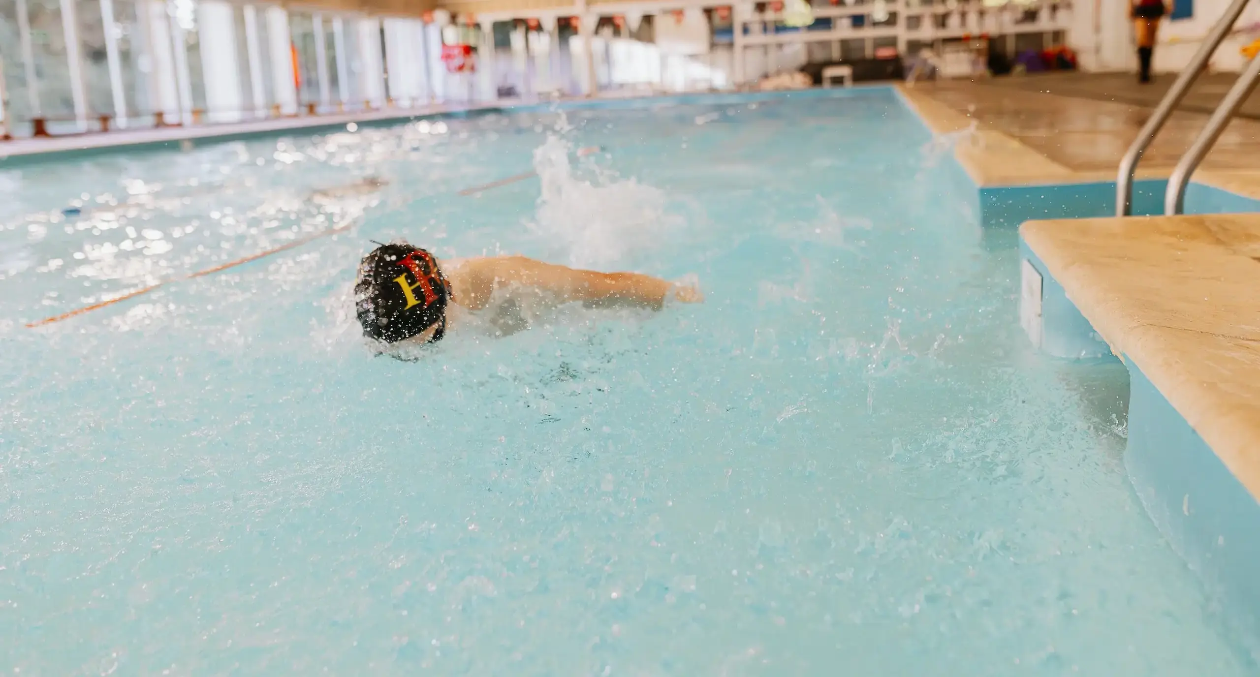 Radnor student swimming in indoor pool