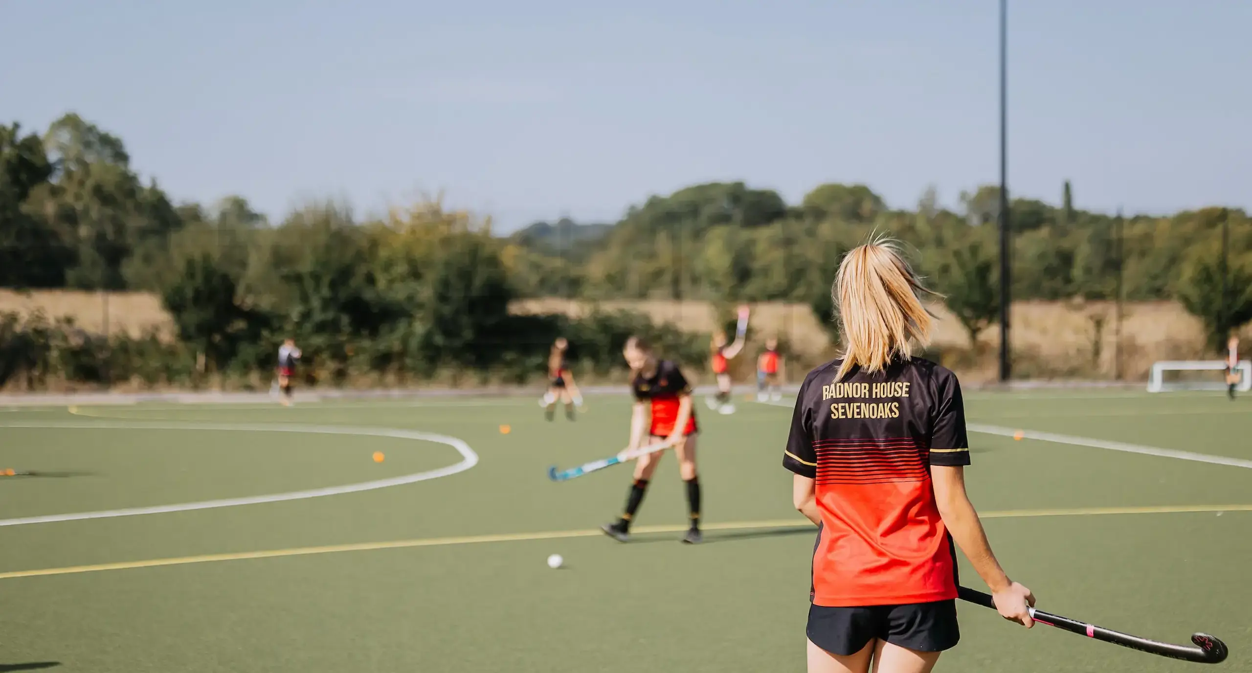 Students playing hockey