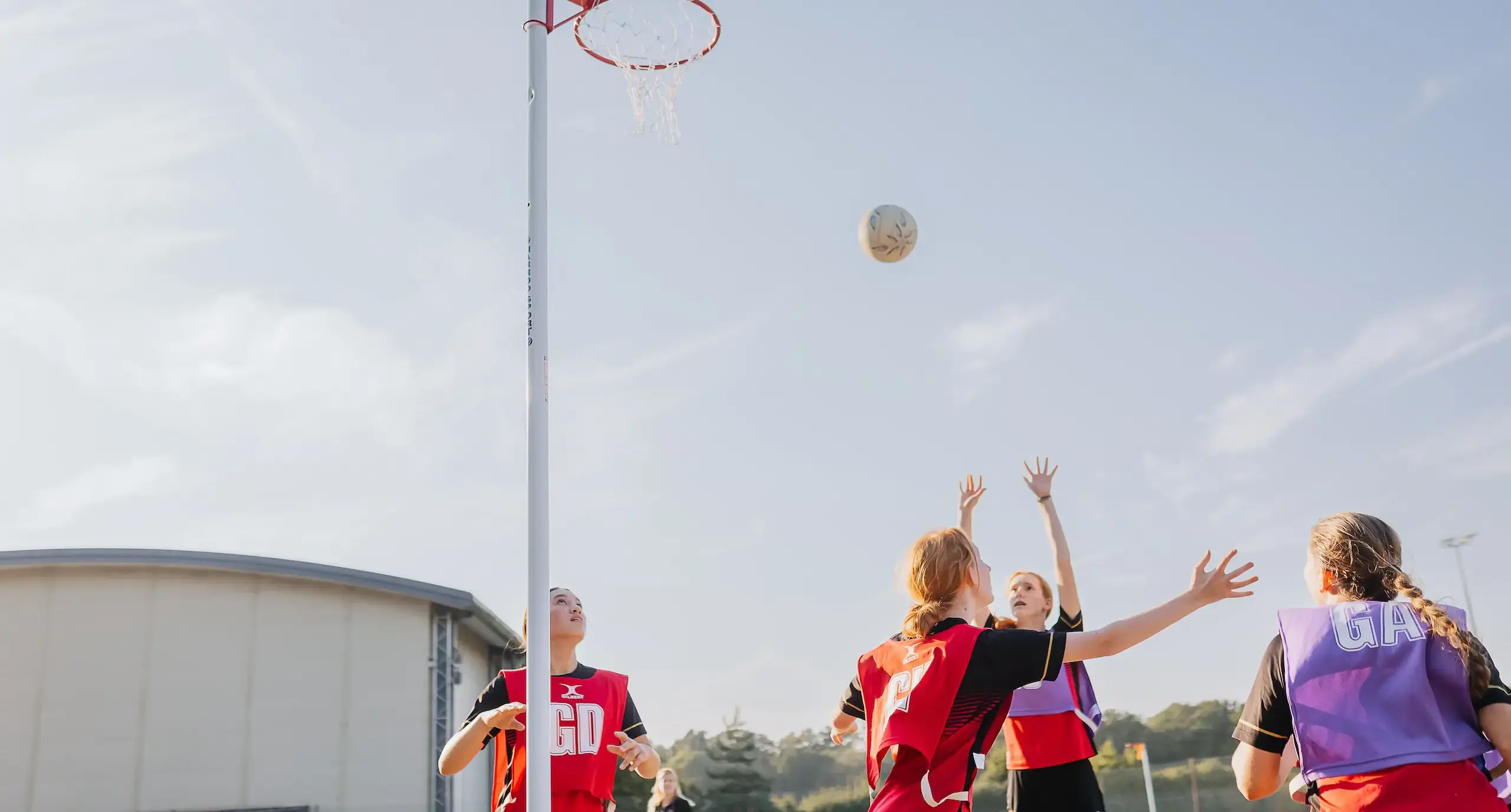 Radnor students making a netball shot